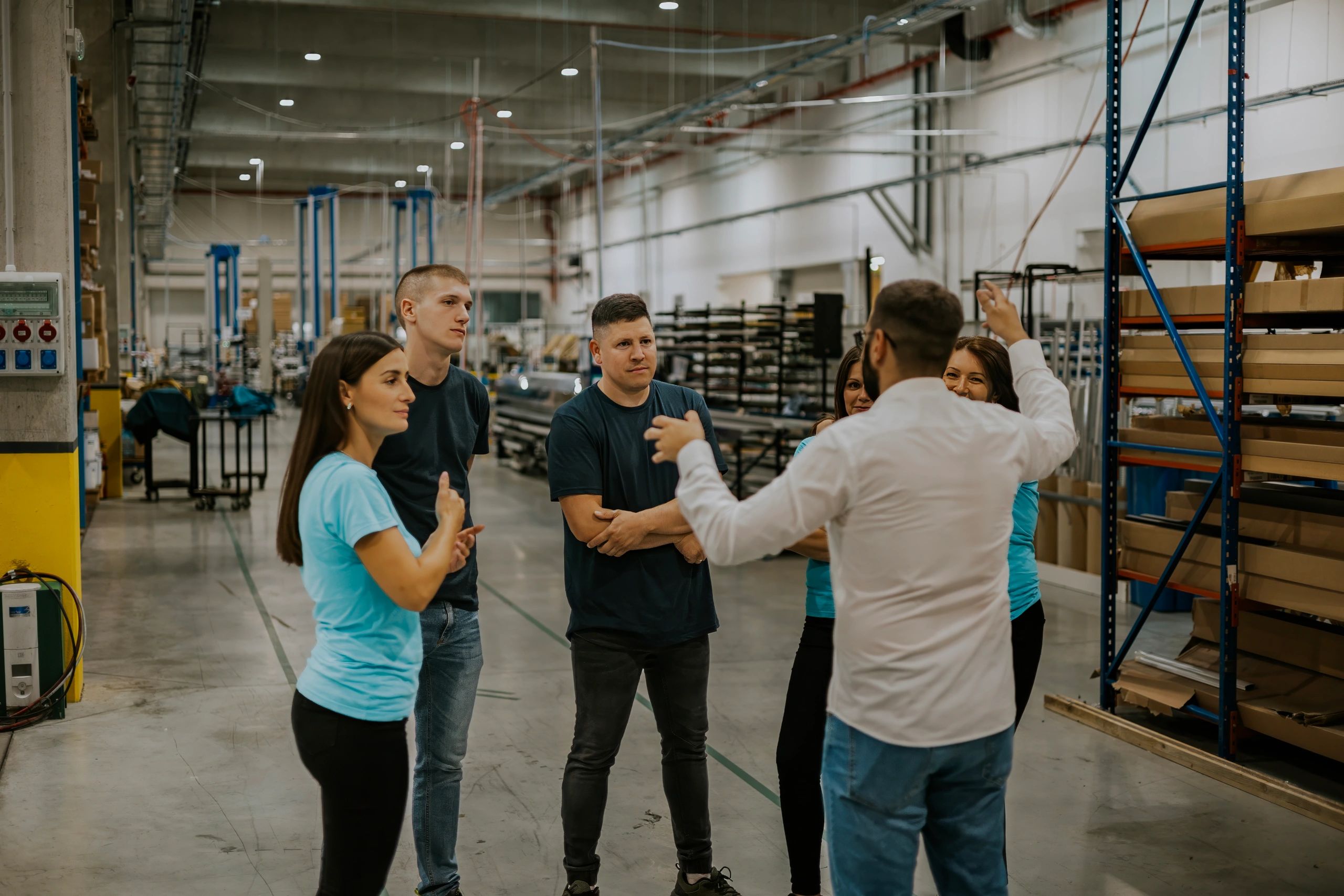 Consultants and factory team discussing operations on-site